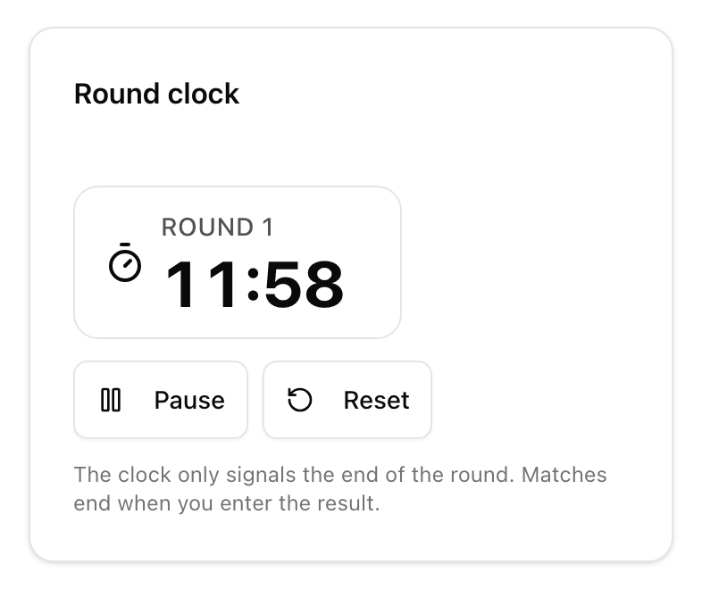 Round clock on a phone showing the running round with a Pause button